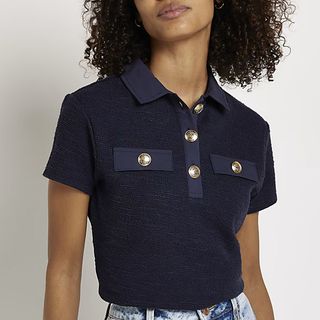 navy polo top with gold buttons