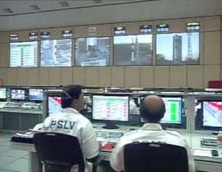 India Space Research Organisation flight controllers watch over the launch countdown of a PSLV rocket on Feb. 25, 2013.