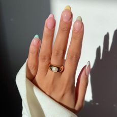a pastel French tip manicure