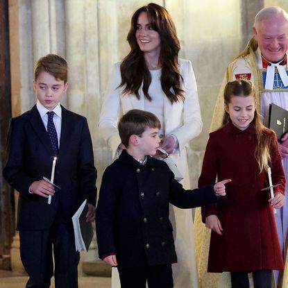 Kate Middleton, Prince George, Prince Louis, and Princess Charlotte at the Christmas Carol service in 2023.