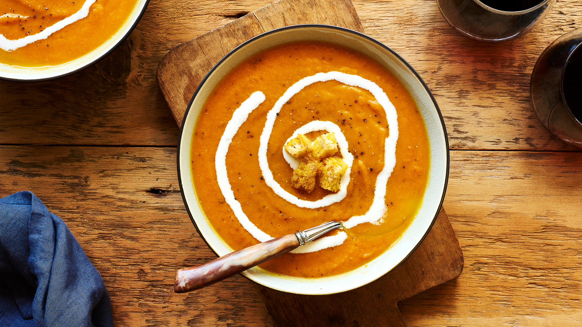 butternut squash soup with a swirl of vegan cream
