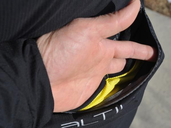 Out back is a big zippered pocket that has ample room for bulkier items plus another trio of smaller pockets tucked away inside.