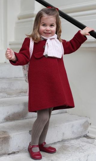 Clothing, Red, Child, Standing, Toddler, Child model, Outerwear, Blond, Footwear, Dress,