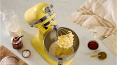 KitchenAid Artisan 4.8L Stand Mixer in the butter hue, which is their 2025 Colour Of The Year