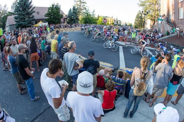 Crowds watch the women come through the final turn