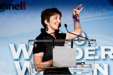 251015-Fox_Networks_Group_executive_vice_president_and_general_counsel_Rita_Tuzon_shows_off_her_Wonder_Woman_costume_to_her_colleagues_0.jpg
