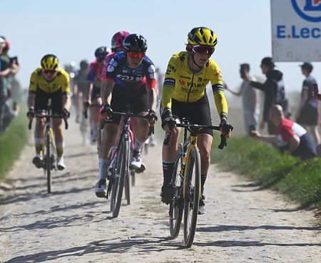 The elite women's peloton, Pauline Ferrand-Prevot, racing on a sunny day at the 2025 Paris-Roubaix Femmes