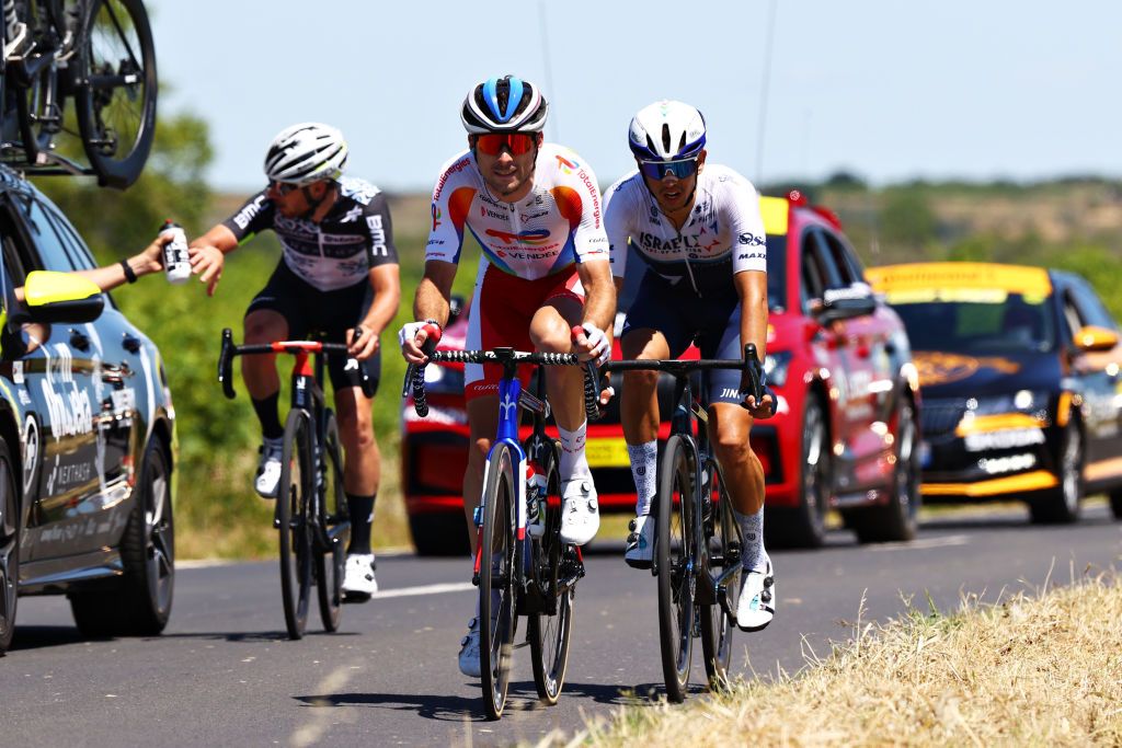 CARCASSONNE FRANCE JULY 09 Sean Bennett of The United States and Team Qhubeka NextHash Pierre Latour of France and Team TotalEnergies Omer Goldstein of Israel and Team Israel StartUp Nation during the 108th Tour de France 2021 Stage 13 a 2199km stage from Nmes to Carcassonne LeTour TDF2021 on July 09 2021 in Carcassonne France Photo by Michael SteeleGetty Images