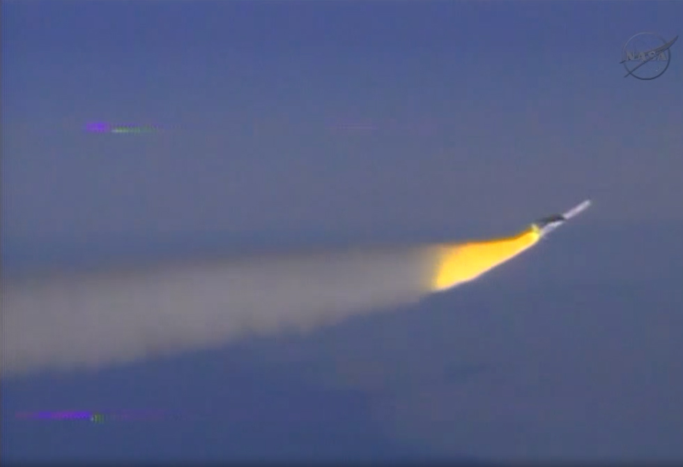 NASA&#039;s IRIS sun-observing telescope launches toward space on an Orbital Sciences Pegasus XL rocket just after its separation from an L-1011 carrier aircraft over the Pacific Ocean on June 27, 2013.