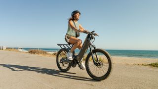 Woman riding Segway Xafari at the beach.