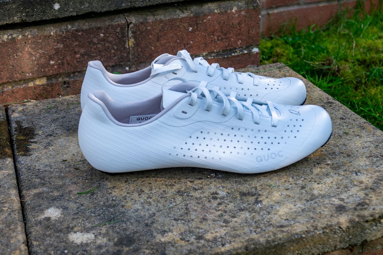 A pair of white Quoc M Pro Lace shoes