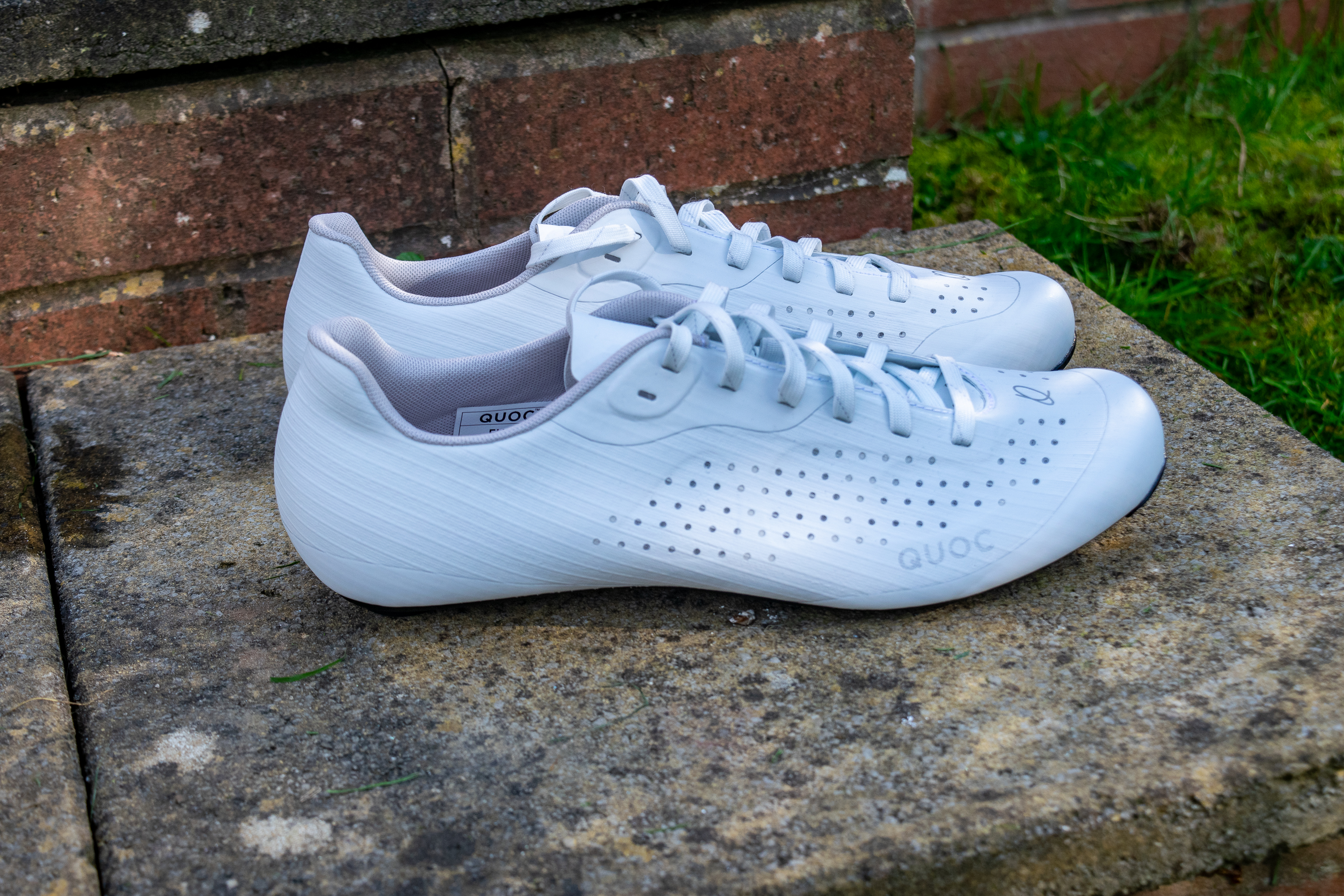 A pair of white Quoc M Pro Lace shoes