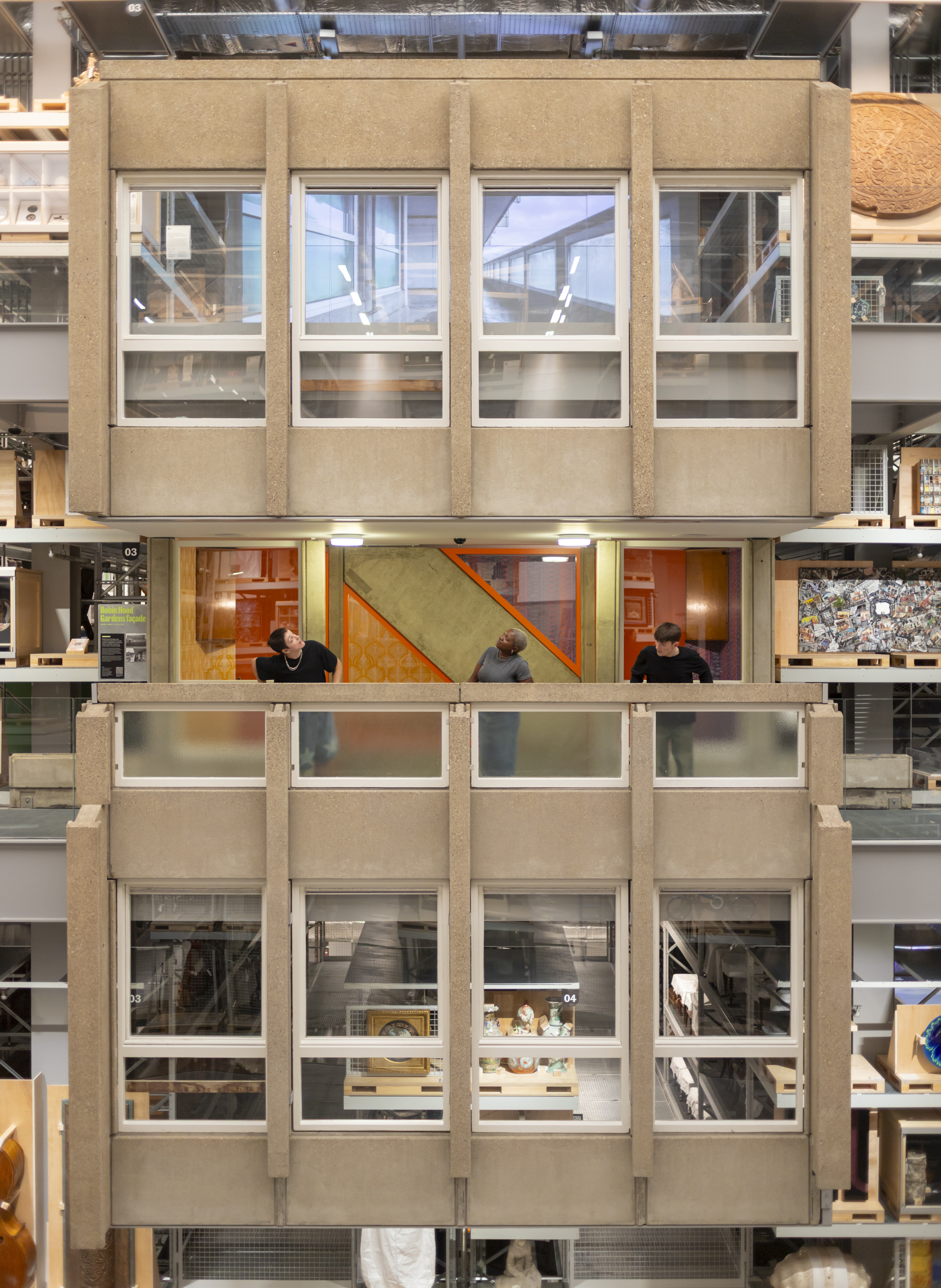A brualist warehouse houses a museum's collection, which includes a fragment of a brutalist residential block, now repurposed within its plan.