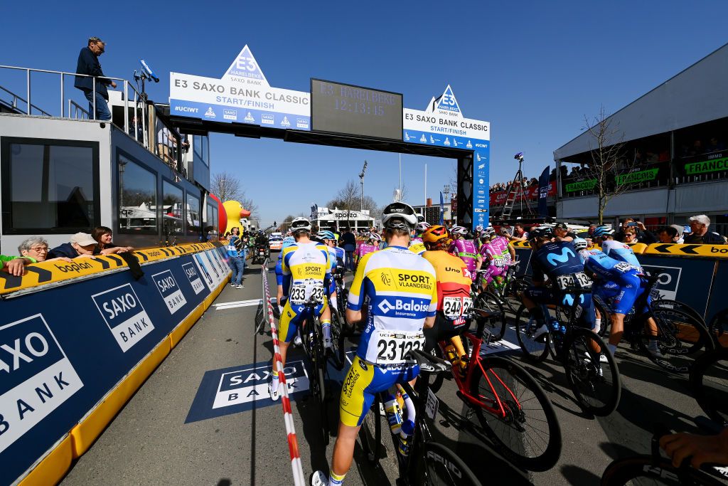 HARELBEKE BELGIUM MARCH 25 Detailed view of Lindsay De Vylder of Belgium Jenno Berckmoes of Belgium and Team Sport Vlaanderen Baloise Lars Saugstad of Norway and UNO X Pro Cycling Team and the peloton during the 65th E3 Saxo Bank Classic 2022 a 2039km one day race from Harelbeke to Harelbeke E3SaxobankClassic WorldTour on March 25 2022 in Harelbeke Belgium Photo by Tim de WaeleGetty Images