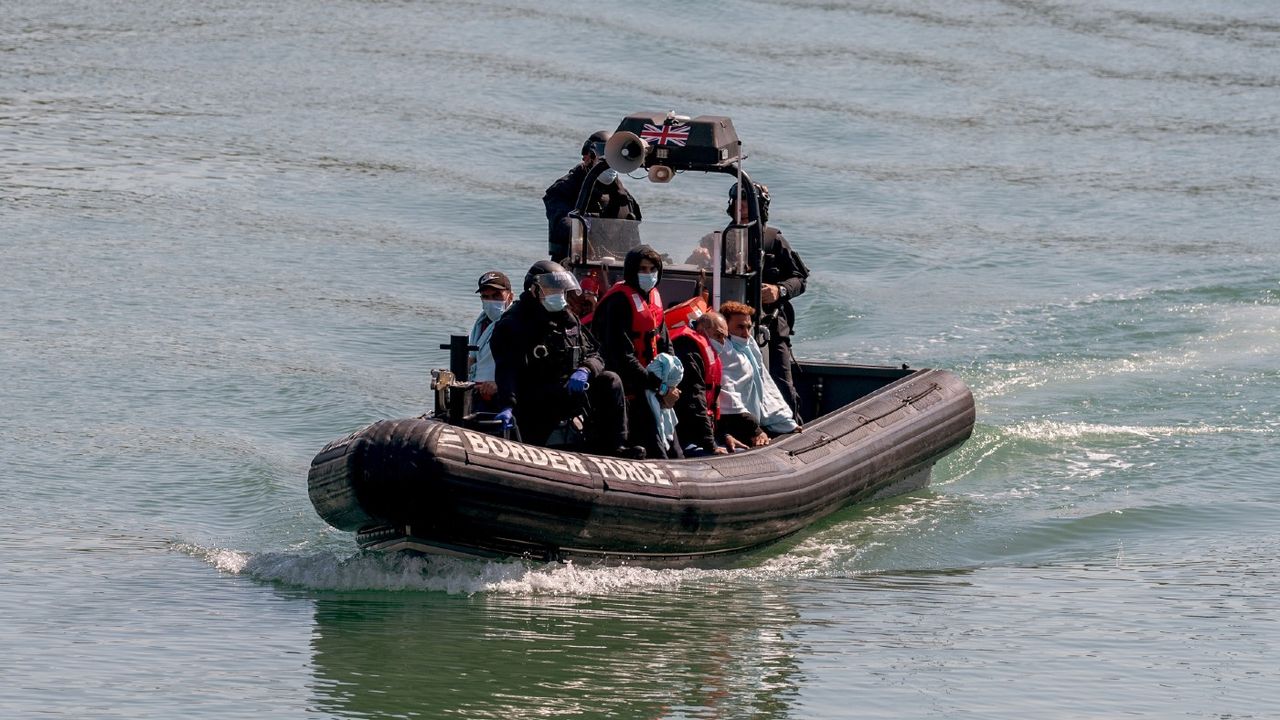  Border Force escorting migrants into Dover 