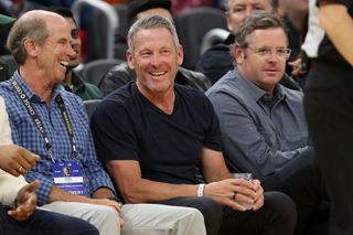Lance Armstrong sits court side during the Golden State Warriors game against the Sacramento Kings in 2022