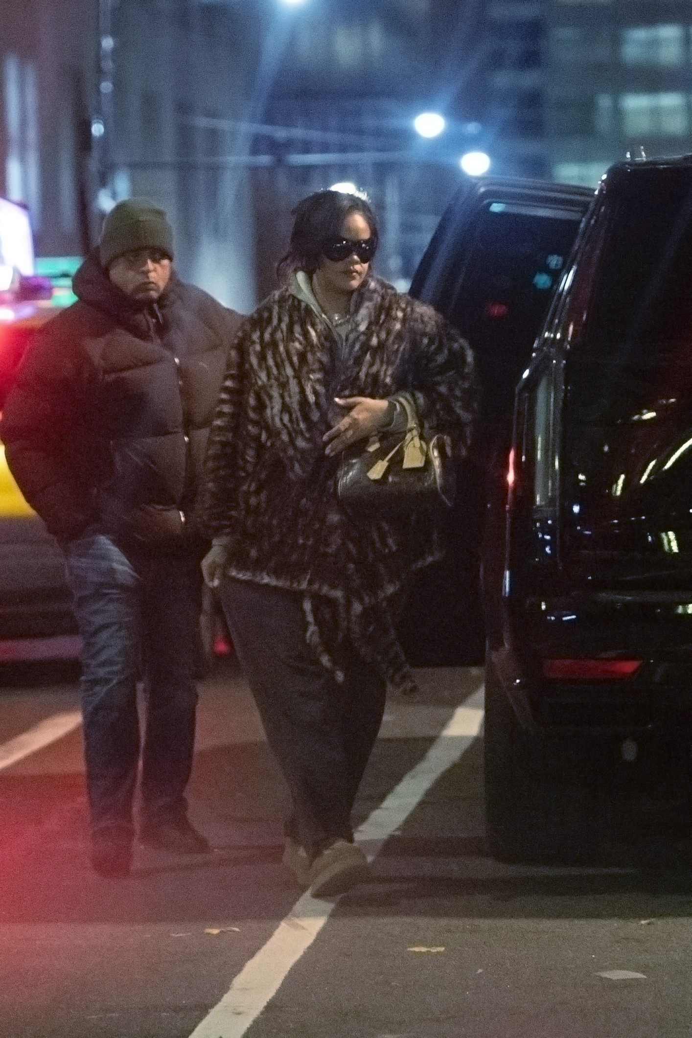 Rihanna paired her Louis Vuitton Speedy Bag with Ugg Mary Jane slippers