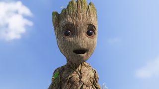 Baby Groot's eyes light up as he smiles at something off camera in I Am Groot on Disney Plus, the latest entry in our Marvel movies in order guide