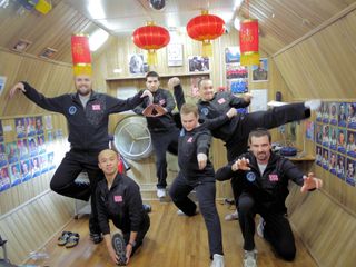 The 6-man crew of the Mars500 mission, a 500-day simulated mission to Mars, poses for a fun photo on Chinese New Year in February 2011.