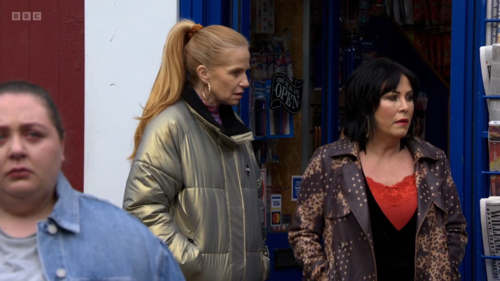 Bianca Jackson and Kat Slater look at a tearful Bernie Taylor as they walk out of the shop.
