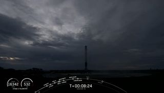 The SpaceX Falcon 9 rocket first stage is seen back on Earth for a touchdown at Landing Zone 1 at Cape Canaveral Air Force Station in Florida after successfully launching Argentina's SAOCOM-1 Earth observation satellite on Aug. 30, 2020.