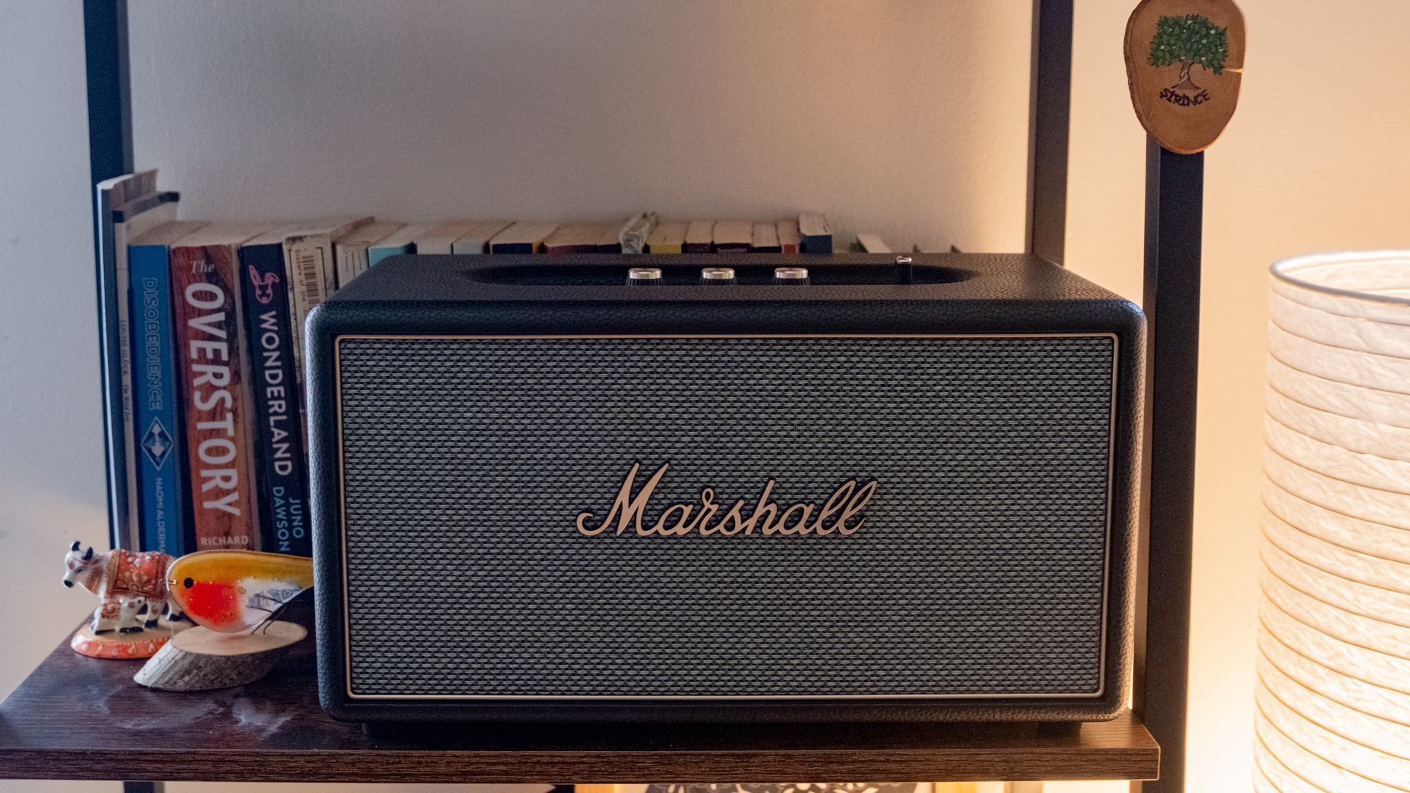 A black Marshall Stanmore IV home speaker