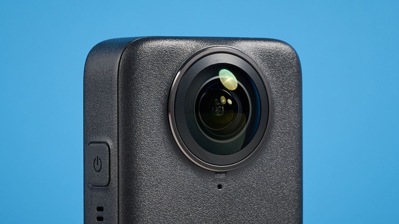 The DJI Osmo 360 against a blue background