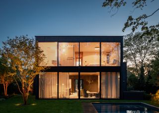 minimalst sag harbour house with large glazed windows and clean aesthetic inside and out