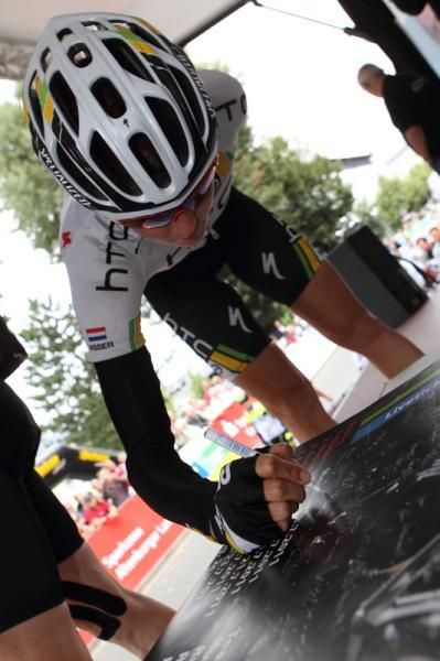 Eventual stage winner, Amanda Miller (HTC-HighRoad), signs on