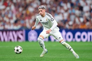 Fede Valverde of Real Madrid with the ball during the UEFA Champions League 2024/25 League Phase MD1 match between Real Madrid CF and VfB Stuttgart at Estadio Santiago Bernabeu on September 17, 2024 in Madrid, Spain. Arsenal