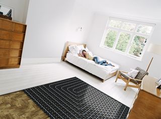 minitec underfloor heating system by Uponor in a bedroom