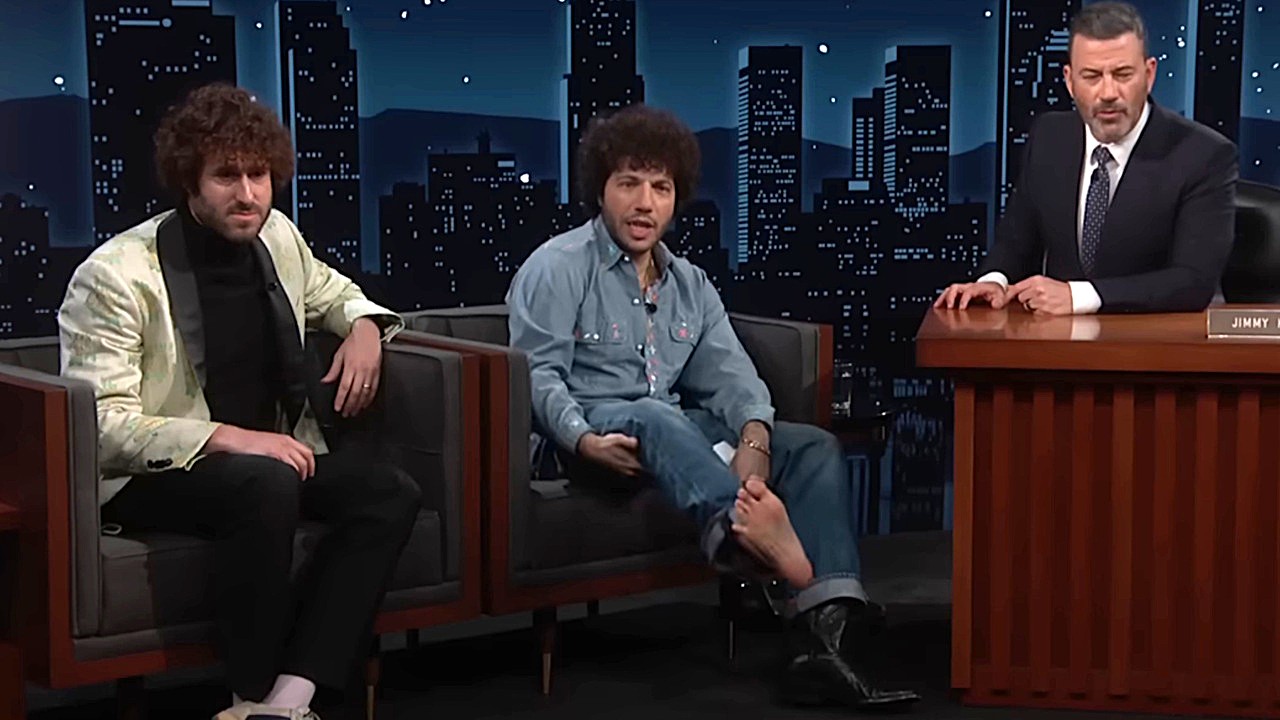 Benny Blanco shows off his clean feet on Jimmy Kimmel Live, while Lil Dicky (Dave Burd) and Jimmy Kimmel look on.