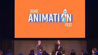SCAD Animation Festival VFX career advice; people sat on a stage in front of a logo and screen