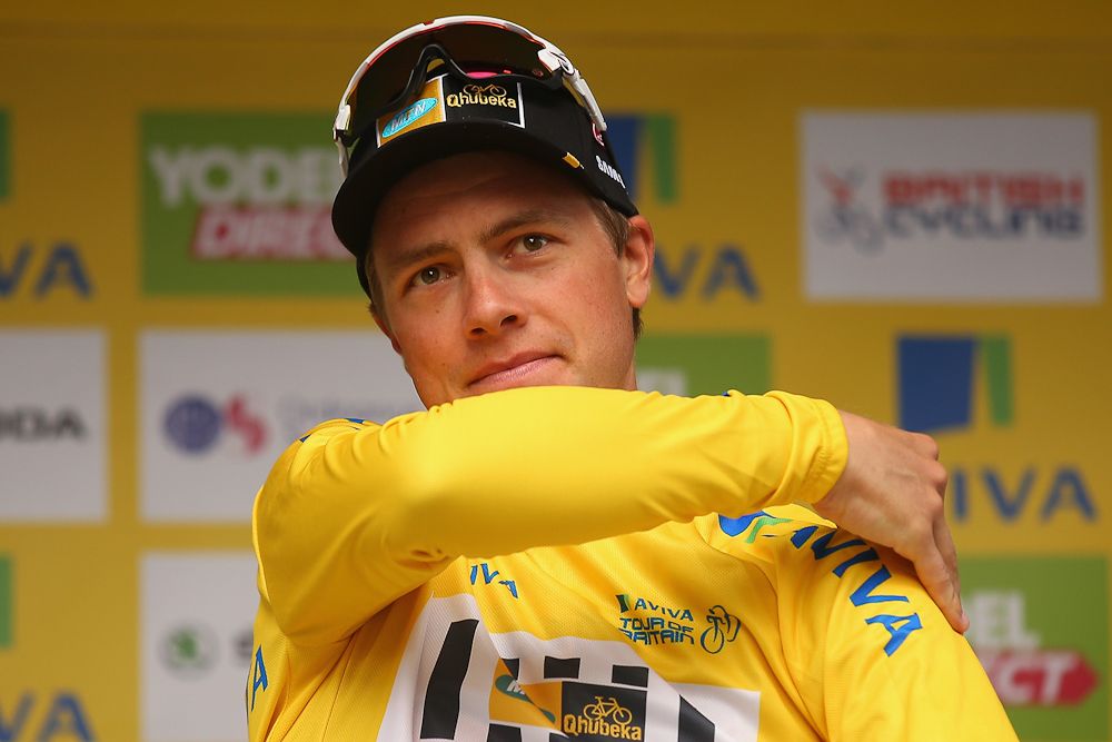 Edvald Boasson Hagen puts on the final yellow jersey at the Tour of Britain.