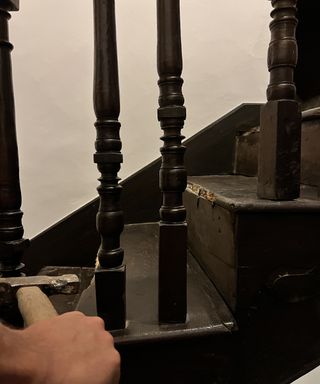 cleaning up dark staircase
