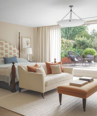 bedroom with cream decor scheme overlooking garden