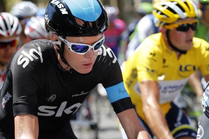 Chris Froome (Sky) rides next to Simon Gerrans (Orica-GreenEdge)