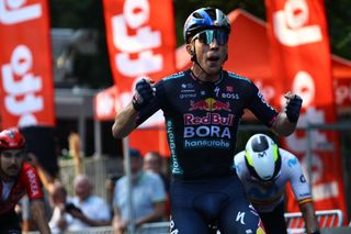 Spanish Roger Adria of Red Bull-Bora-Hansgrohe celebrates as he crosses the finish line to win the one day cycling race Grand Prix de Wallonie 2024 