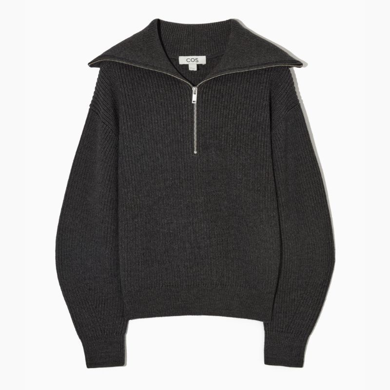 flat lay of cos half zip sweater