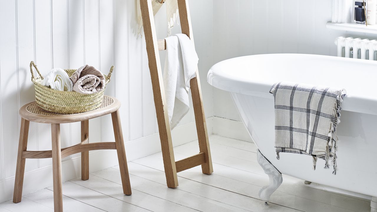 White bathroom with IKEA towel rack