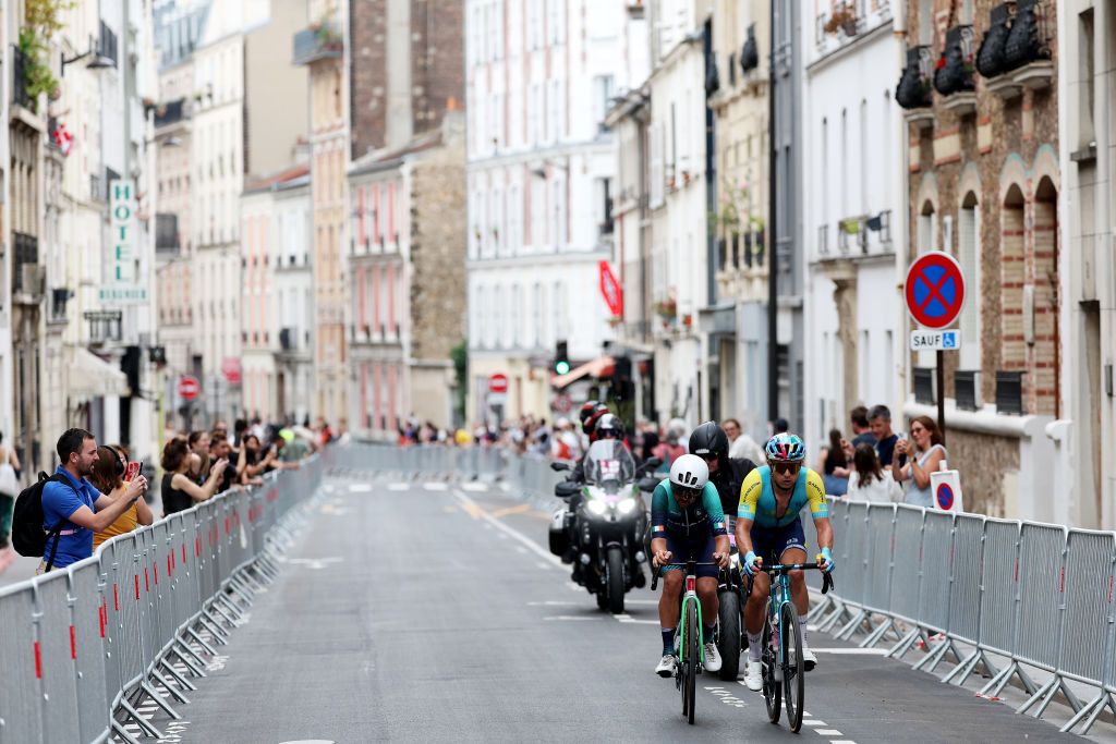 PARIS FRANCE AUGUST 03 Ben Healy of Team Ireland and Alexey Lutsenko of Team Kazakhstan compete in the breakaway during the Mens Road Race on day eight of the Olympic Games Paris 2024 at trocadero on August 03 2024 in Paris France Photo by Tim de WaeleGetty Images