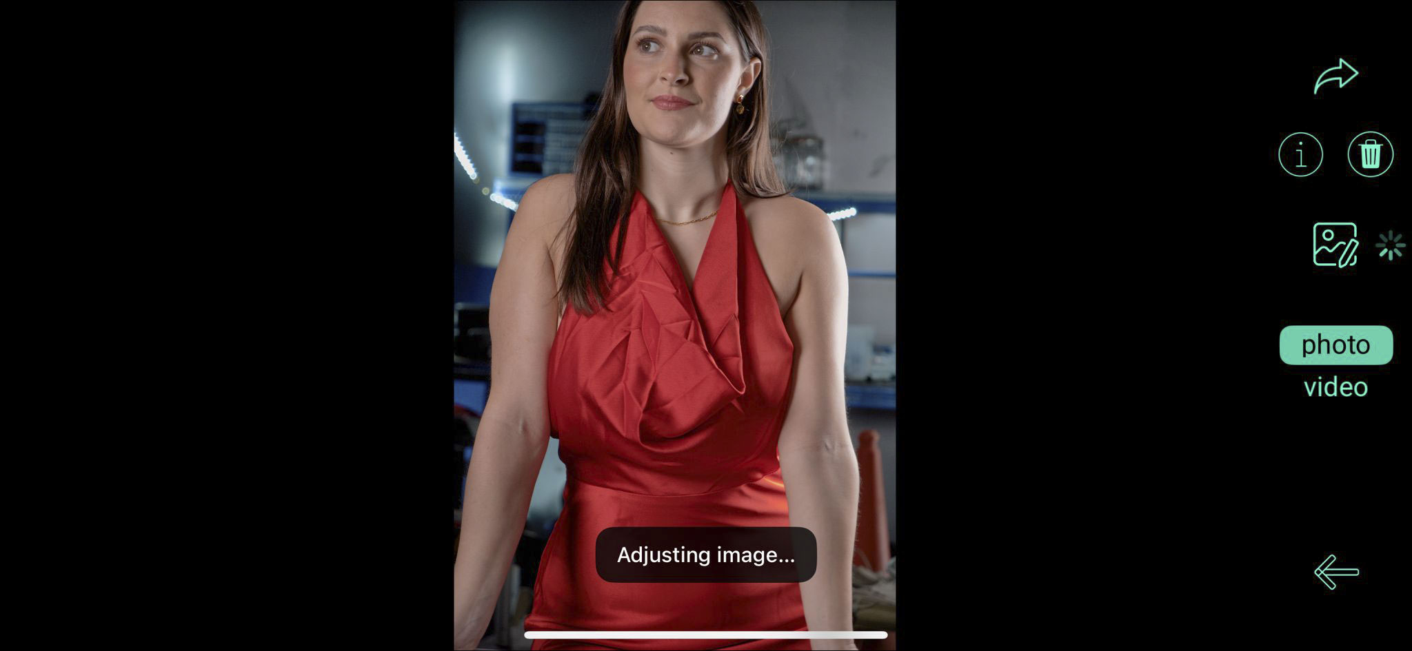 Caira camera user interface with a photo of a lady in a red dress, image processing