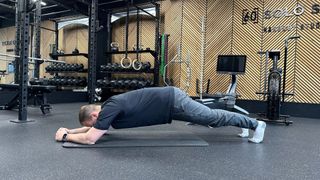 Ollie Thompson demonstrates the long lever plank