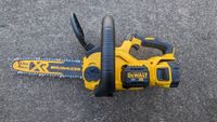 DeWALT deals | Top view of the DeWalt 20V MAX XR DCCS620P1 12 in. Battery Chainsaw as it lays on its side
