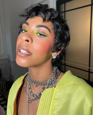 Rico Nasty with immaculate makeup.