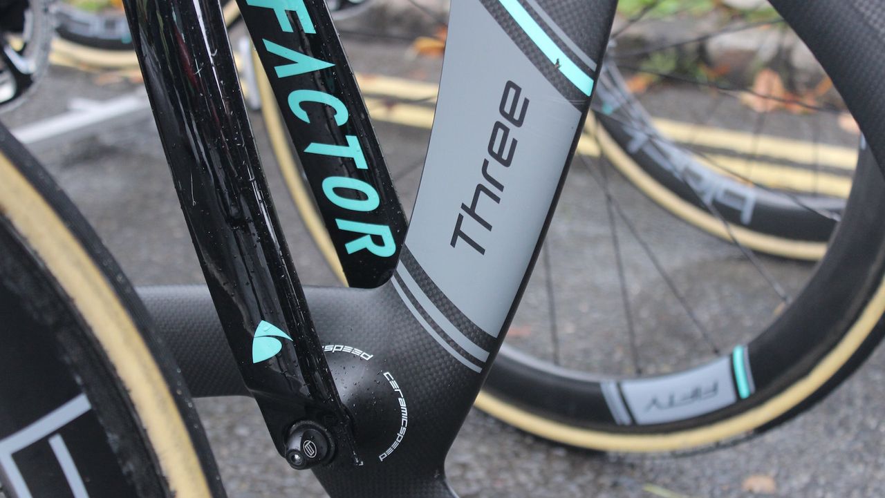 The Black Inc front wheel rolls on a Ceramic Speed front hub