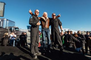 Virgin Galactic pilots Mark "Forger" Stucky (at left) and Frederick "CJ" Sturckow are joined by company founder Richard Branson following their Dec. 13, 2018, SpaceShipTwo flight into space at the Mojave Air and Space Port in California.