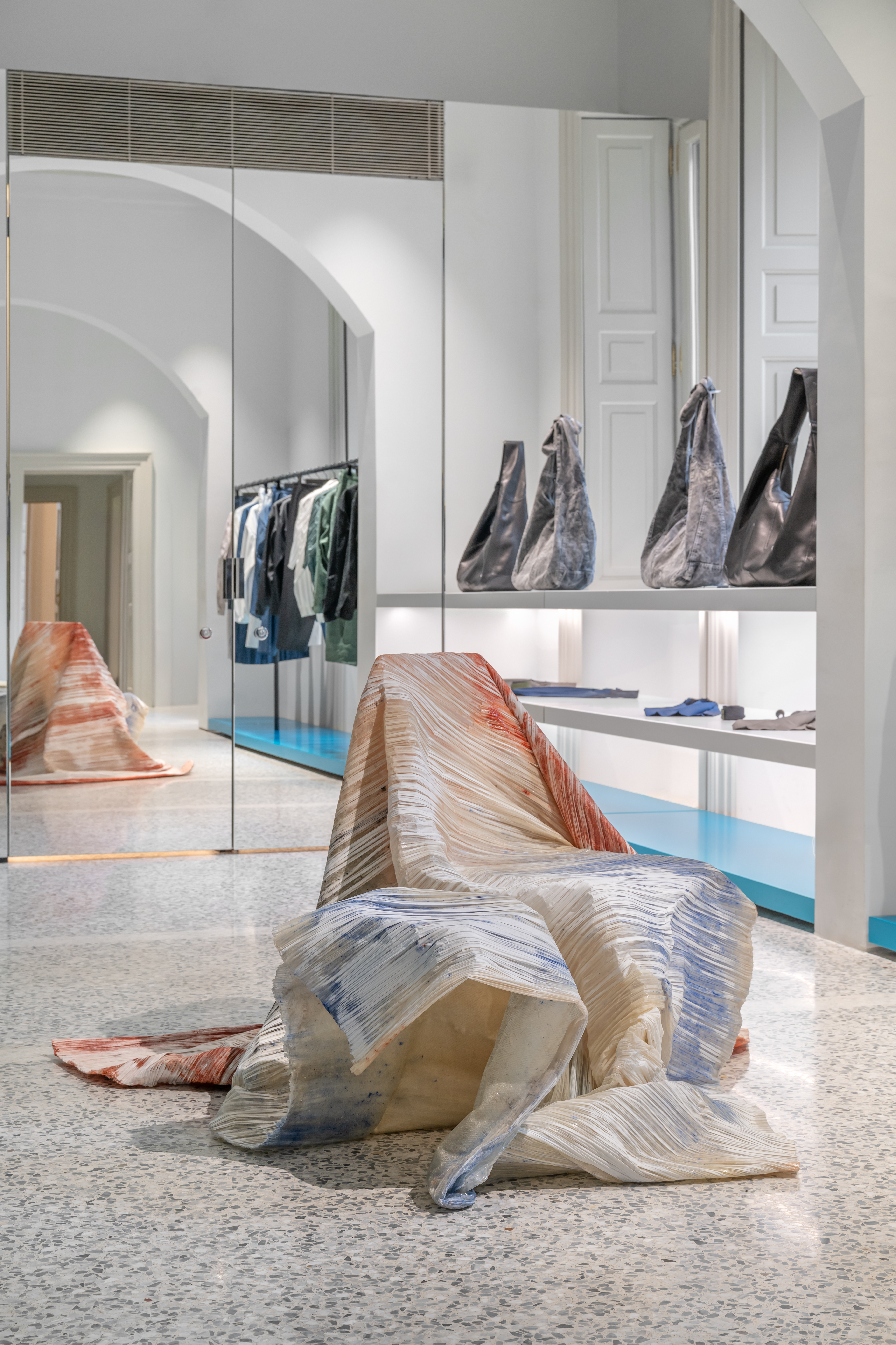 Sculptural paper installation at Issey Miyake store in Milan during Design Week 2026