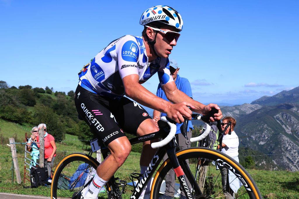 LACRUZDELINARES SPAIN SEPTEMBER 14 Remco Evenepoel of Belgium and Team Soudal Quick Step Polka dot Mountain Jersey competes in the breakaway climbing to the Puerto de la Cruz de Linares 840m during the 78th Tour of Spain 2023 Stage 18 a 1789km stage from Pola de Allande to La Cruz de Linares 840m UCIWT on September 14 2023 in La Cruz de Linares Spain Photo by Alexander HassensteinGetty Images