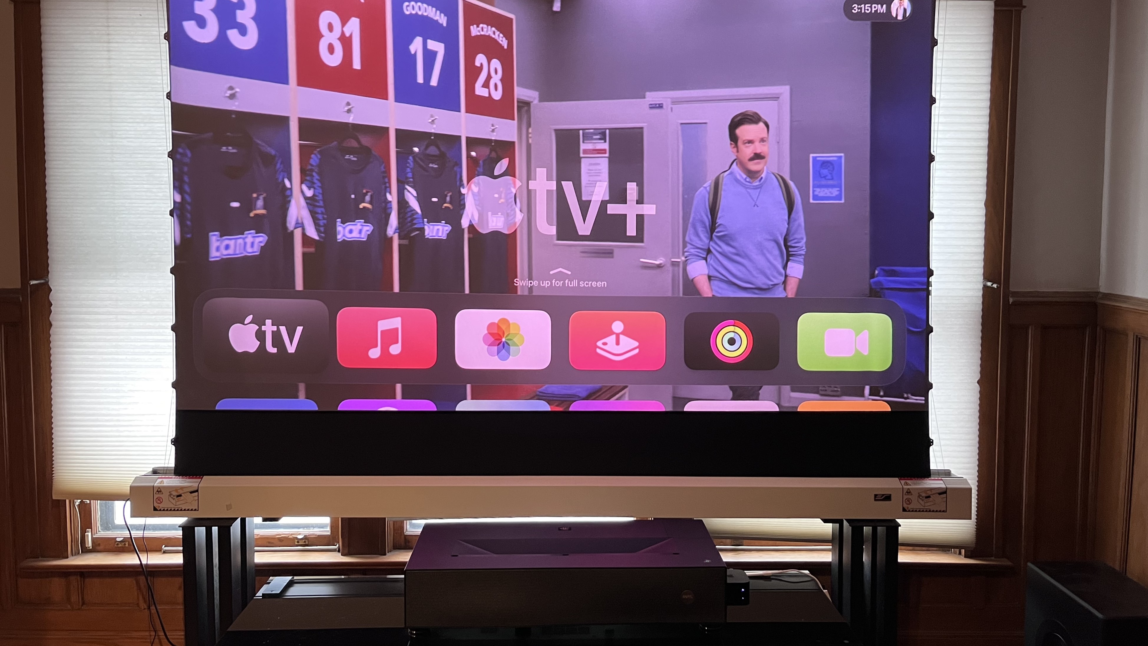 BenQ v5000i projector showing Apple TV interface